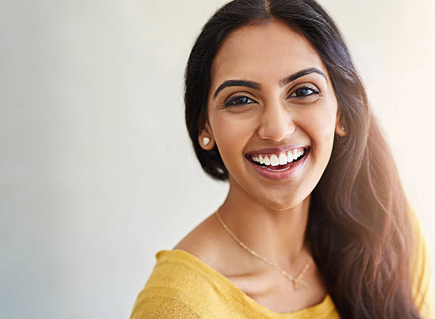 Studio portrait of an attractive and happy young woman